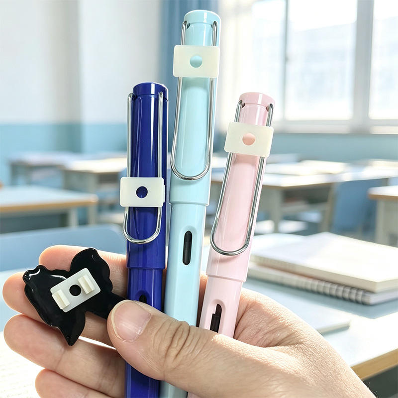 White nylon pen clip charms on colorful pens