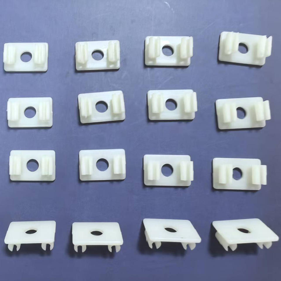 White pen clip charm set arranged on a surface