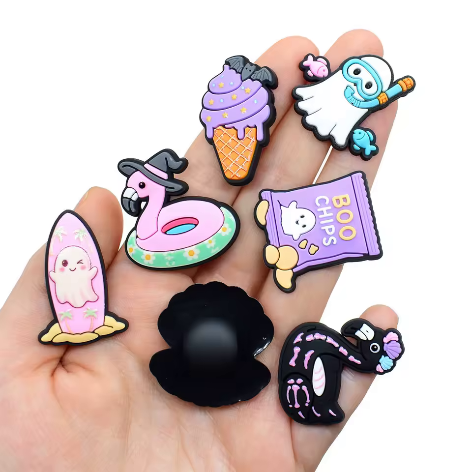 Close-up of assorted cartoon beach and Halloween PVC shoe charms