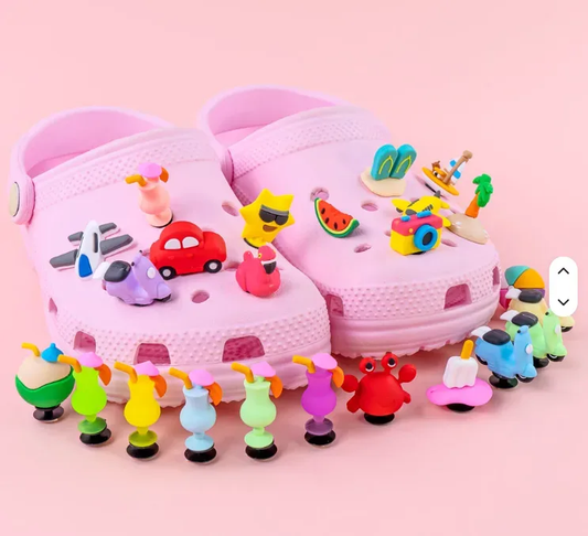 Cute assorted PVC shoe charms on foam clogs
