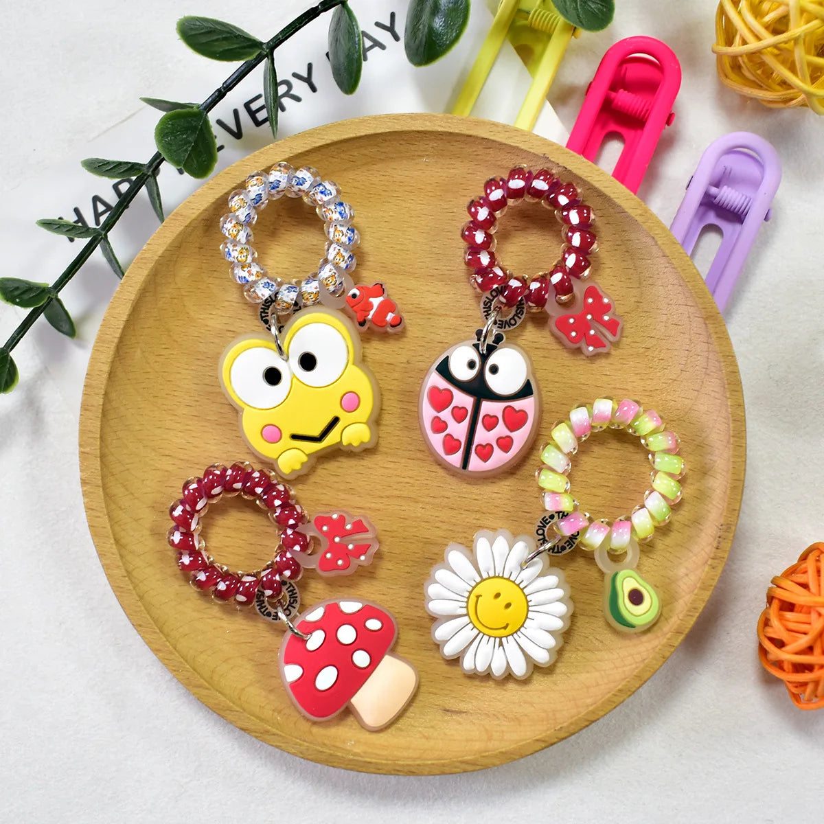 Colorful butterfly PVC hair tie charm detail