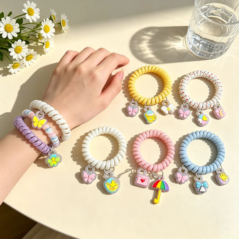 Pastel spiral coil hair tie with kawaii PVC charm product image 1