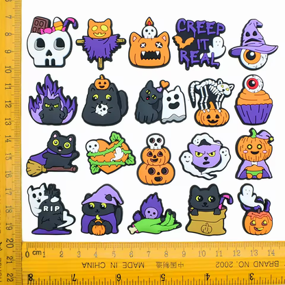 Assorted scary Halloween PVC shoe charms with size reference